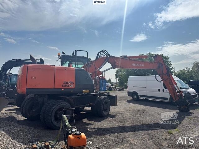 Radbagger Hitachi ZX140W-5B Wheeled excavator w/ Rototilt and 2 buck