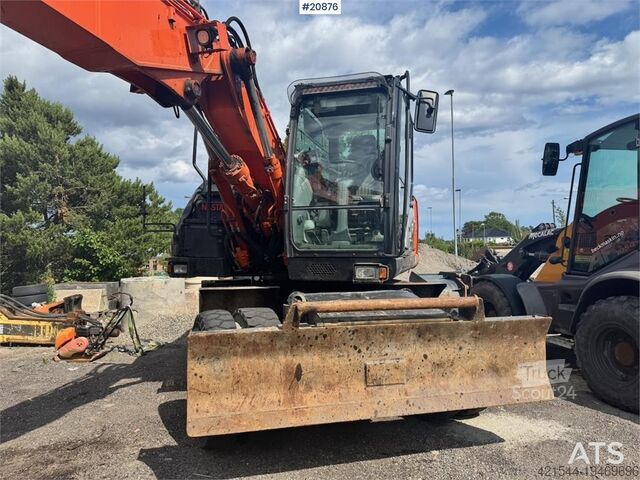 Radbagger Hitachi ZX140W-5B Wheeled excavator w/ Rototilt and 2 buck
