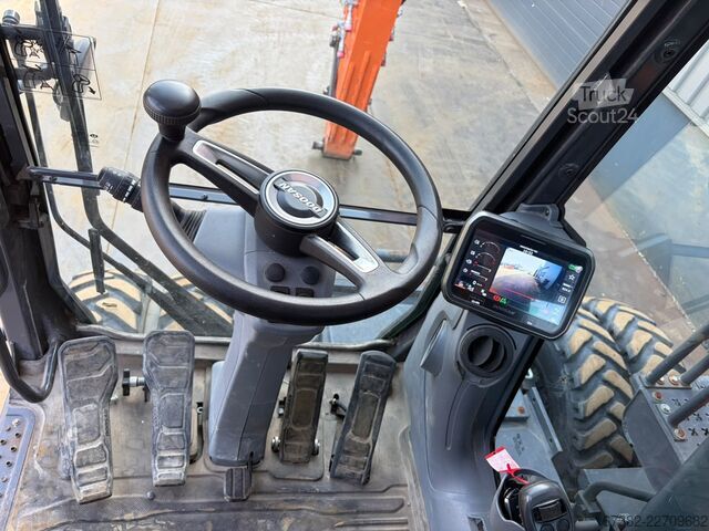 Kolesni bager Develon DX160W-7