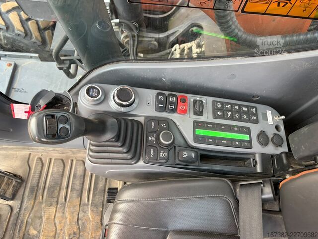 Kolesni bager Develon DX160W-7