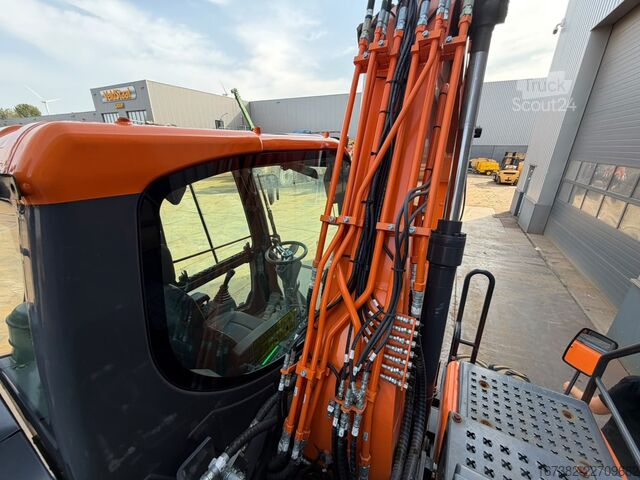 Kolesni bager Develon DX160W-7