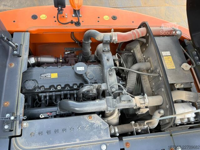 Kolesni bager Develon DX160W-7