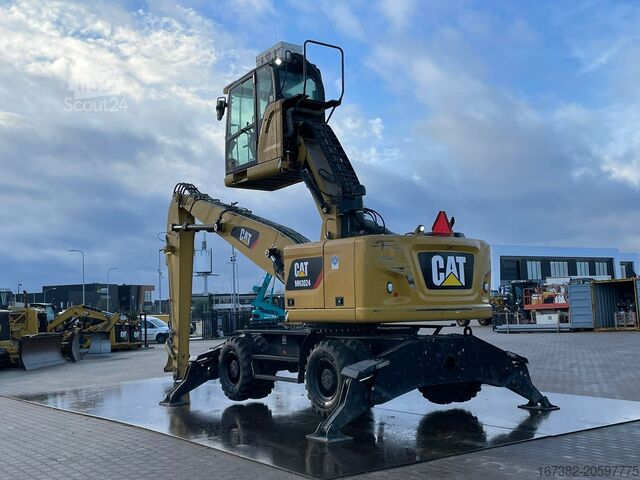 Kolesni bager Caterpillar MH3024