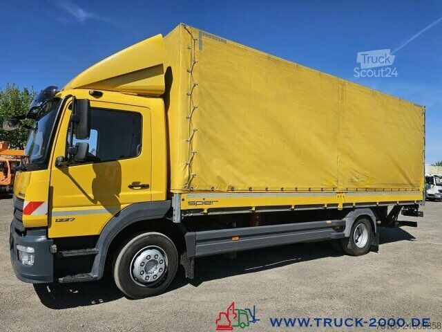 Вантажівка з платформою і тентом Mercedes-Benz Atego 1227 Plane Spriegel LBW BÄR 1.500 Kg + AHK