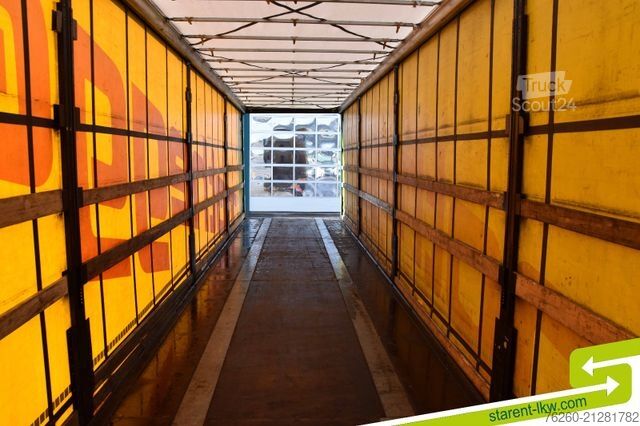 Nyitott ponyvás félpótkocsi KÖGEL Palettenkasten Lochrahmen SAF Achsen Zurringe