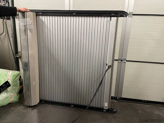 Roll-up cover for the loading bed of a pick-up *Cover for pick-up loading bed Oprolbare afdekking voor laadbak van een pick-up *Afdekking voor laadbak pick-up