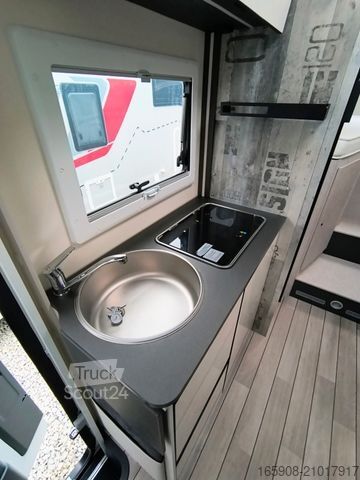 Half-integraal camper FORSTER Coupe Slim 669 EB Aktion Messe Solar Markise