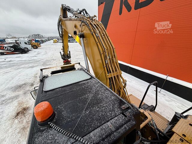 гусеничный экскаватор Caterpillar 323 ROTOTILT / AC / CENTRAL LUBRICATION