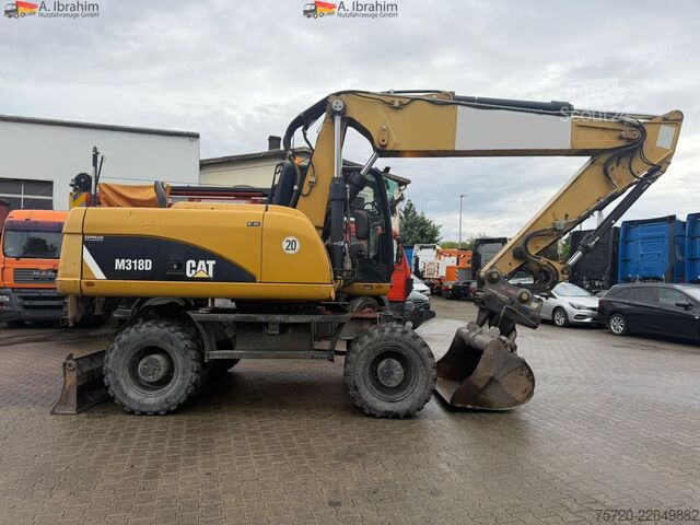 Kolesový bager Caterpillar M318D Schnellwechsler Schwenkfunktion OilQuick OQ70 55 Klima Verstellausleger