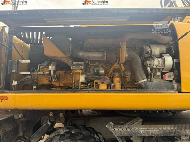 Kolesový bager Caterpillar M318D Schnellwechsler Schwenkfunktion OilQuick OQ70 55 Klima Verstellausleger
