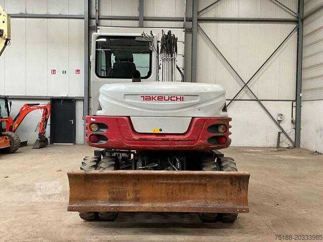 حفارة ذات عجلات Takeuchi TB 295 W powertilt