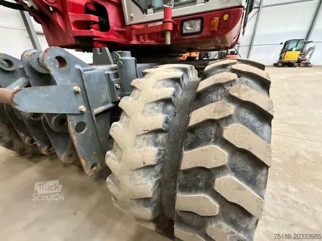 حفارة ذات عجلات Takeuchi TB 295 W powertilt