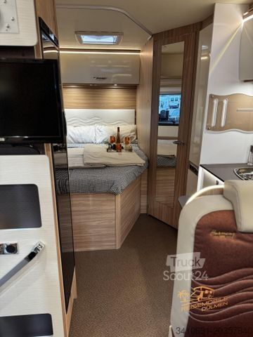 Camper semintegrato BÜRSTNER Delfin T 660 Solar SAT TV Navi RFK Fahrradträger