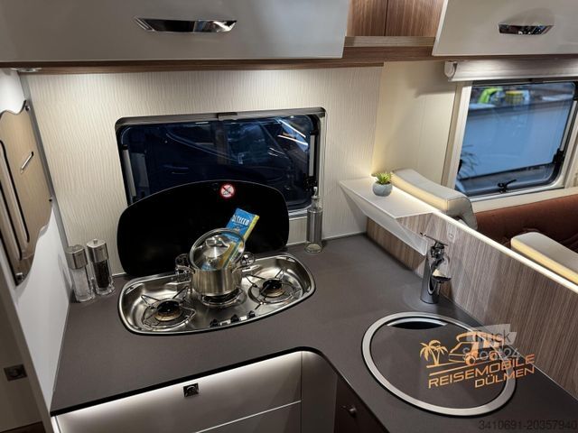 Camper semintegrato BÜRSTNER Delfin T 660 Solar SAT TV Navi RFK Fahrradträger