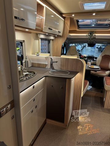 Camper semintegrato BÜRSTNER Delfin T 660 Solar SAT TV Navi RFK Fahrradträger