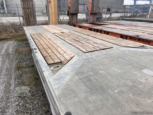 Remorcă cu platformă joasă Möslein TO 3 F Schwebheim  3 Achs Tiefladeranhänger 9 m Ladefläche