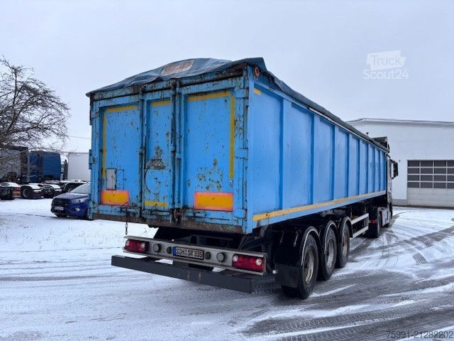 Billenős félpótkocsi  Stahlmuldenkipper für Schrotttransport