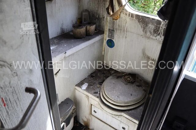 Reisebus Van Hool EX 16 M / Fire damaged / Seats available