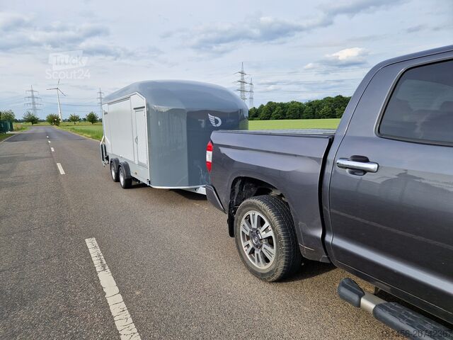 Kofferanhänger Debon C1000 Flügeltürer mit Heckrampe Pullman