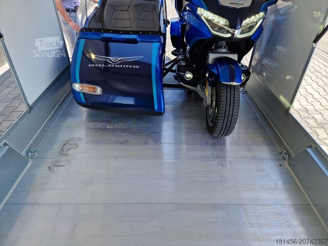 Kofferanhänger Debon C1000 Flügeltürer mit Heckrampe Pullman