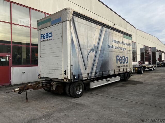 Відкритий причіп з тентом Fliegl ZPS180 2 Achs Jumbo-Planenanhänger