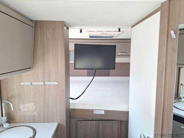 Alkovový obytný automobil CARADO pro A 132  AUTOMATIK, SAT+TV, NAVI+RFK, MARKISE