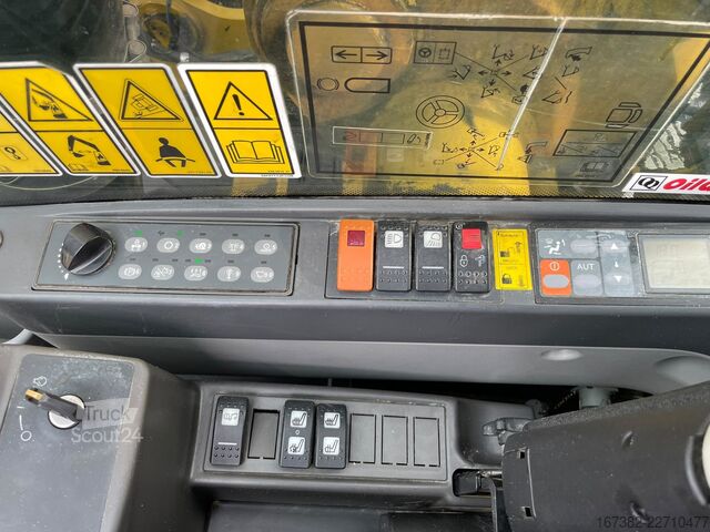 Escavadora de rodas Caterpillar M322D