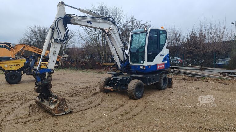 Koparka samojezdna Hyundai R55W-9A with 3 excavator buckets