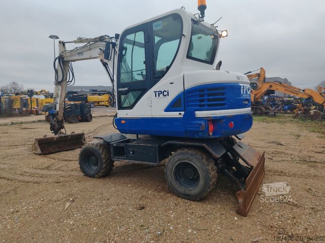 Koparka samojezdna Hyundai R55W-9A with 3 excavator buckets