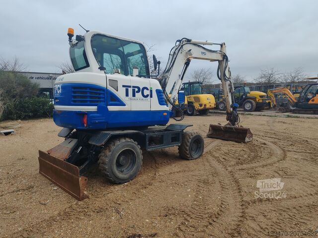 Koparka samojezdna Hyundai R55W-9A with 3 excavator buckets