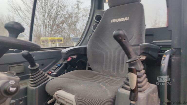 Koparka samojezdna Hyundai R55W-9A with 3 excavator buckets