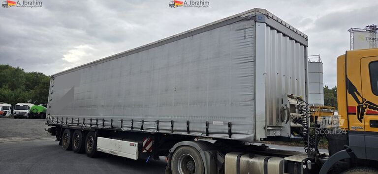 Åben sættevogn med presenning Krone SD Maschinentransporter, verbreiterbar Liftachse