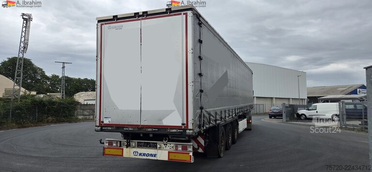 Åben sættevogn med presenning Krone SD Maschinentransporter, verbreiterbar Liftachse