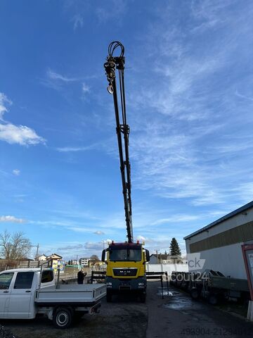 Gru montata su autocarro MAN TGA 33.400 6x4 +Hiab