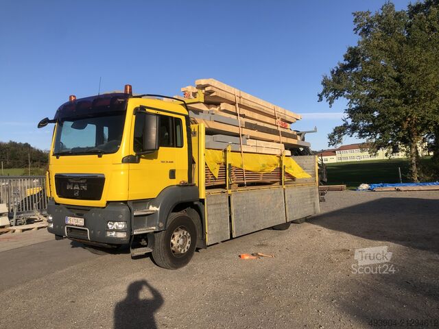 Gru montata su autocarro MAN TGA 33.400 6x4 +Hiab