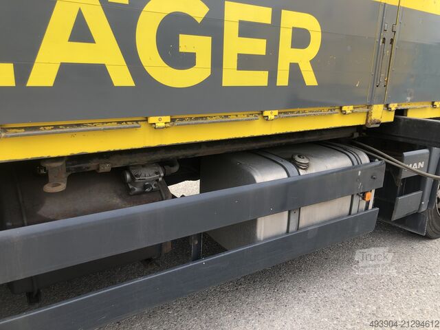 Gru montata su autocarro MAN TGA 33.400 6x4 +Hiab