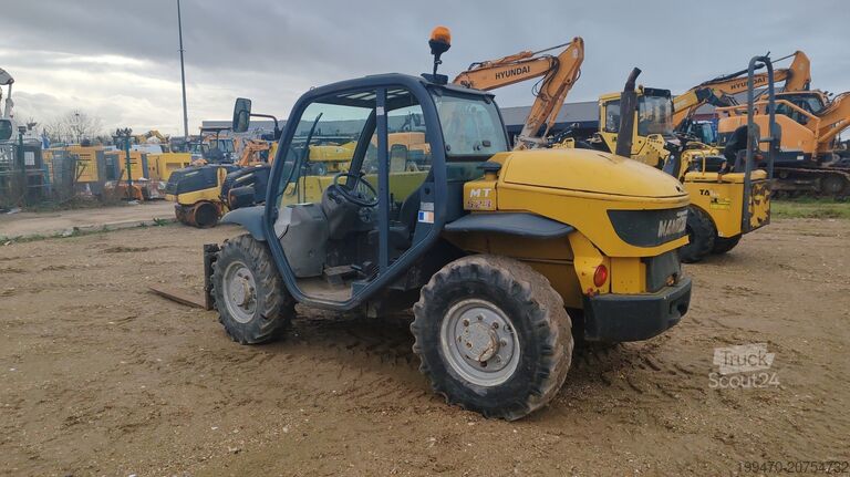 Teleskooppinen käsittelijä Manitou MT523