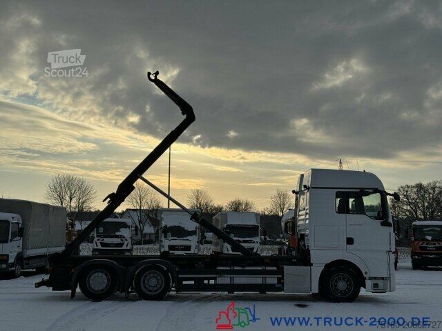 Roll-off tipper truck MAN TGX 26.500 XXL Haus Meiller 20t. Haken Retarder