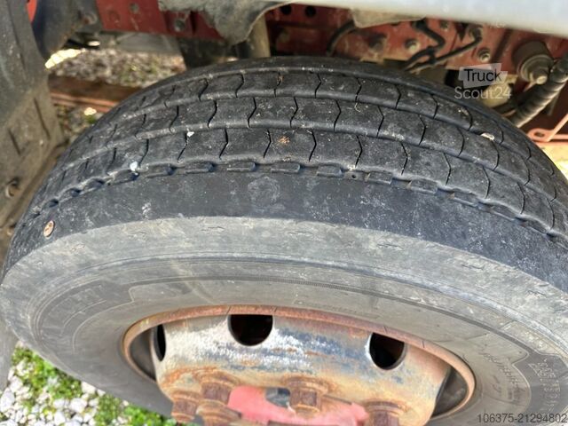 Camion cu platformă și prelată IVECO EUROCARGO 80E18