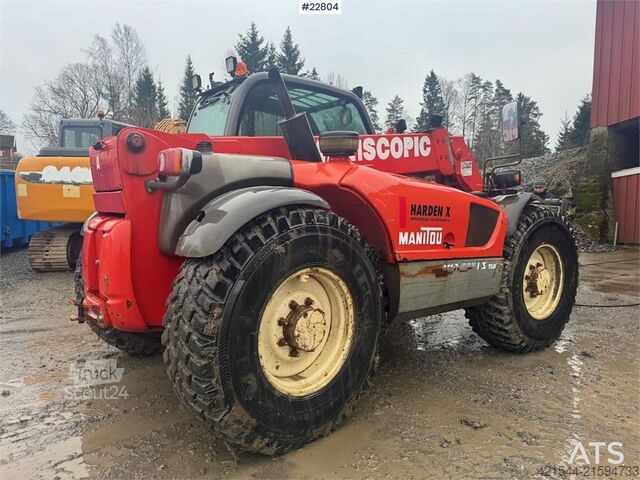 Caricatore Manitou MLT 633 telehandler with hydraulic pallet forks.