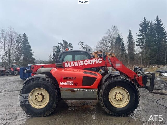 Caricatore Manitou MLT 633 telehandler with hydraulic pallet forks.