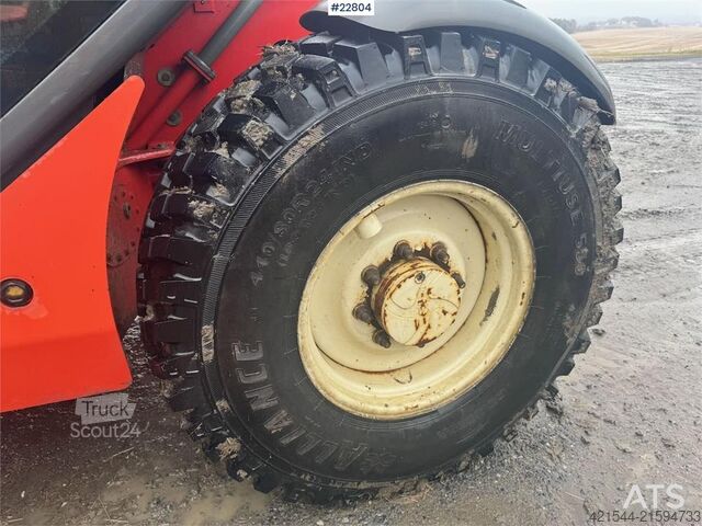 Caricatore Manitou MLT 633 telehandler with hydraulic pallet forks.