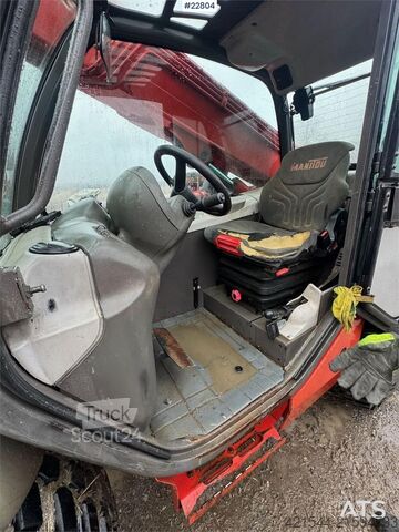 Caricatore Manitou MLT 633 telehandler with hydraulic pallet forks.