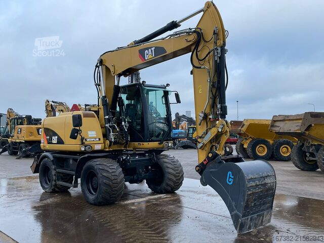 Excavator pe roți Caterpillar M313D - CE