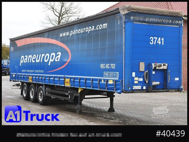 Auflieger mit Pritsche & Plane SCHMITZ Tautliner, Code XL, Bahn, verzinkt