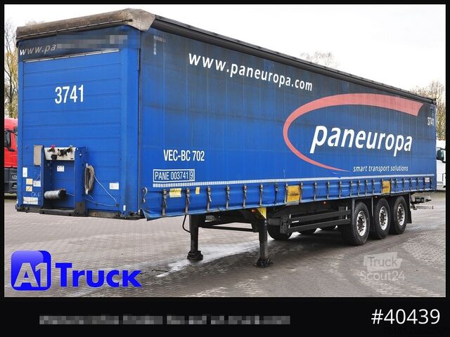 Auflieger mit Pritsche & Plane SCHMITZ Tautliner, Code XL, Bahn, verzinkt