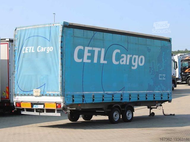 Відкритий причіп з тентом AGADOS DONA 58