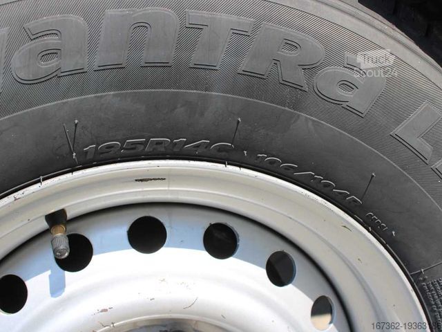 Відкритий причіп з тентом AGADOS DONA 58