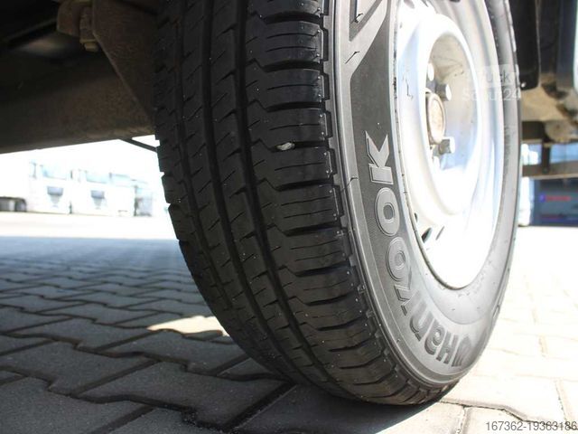 Відкритий причіп з тентом AGADOS DONA 58