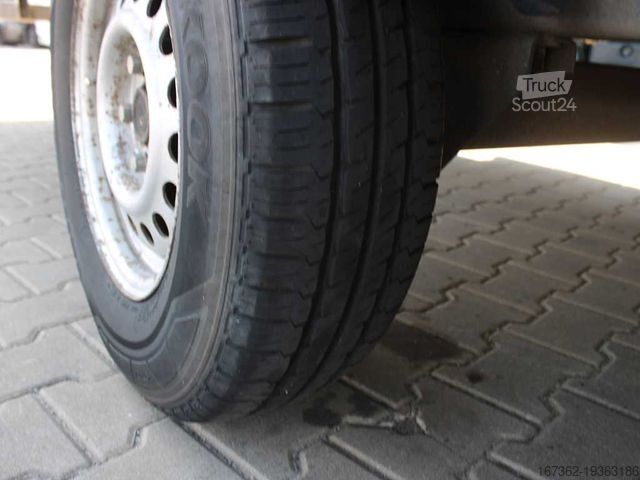 Відкритий причіп з тентом AGADOS DONA 58